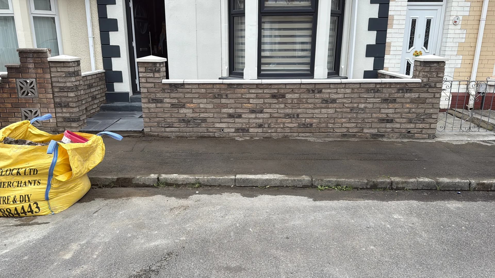 Front garden brick wall with piers and coping by Reynolds Brickwork in Bridgend