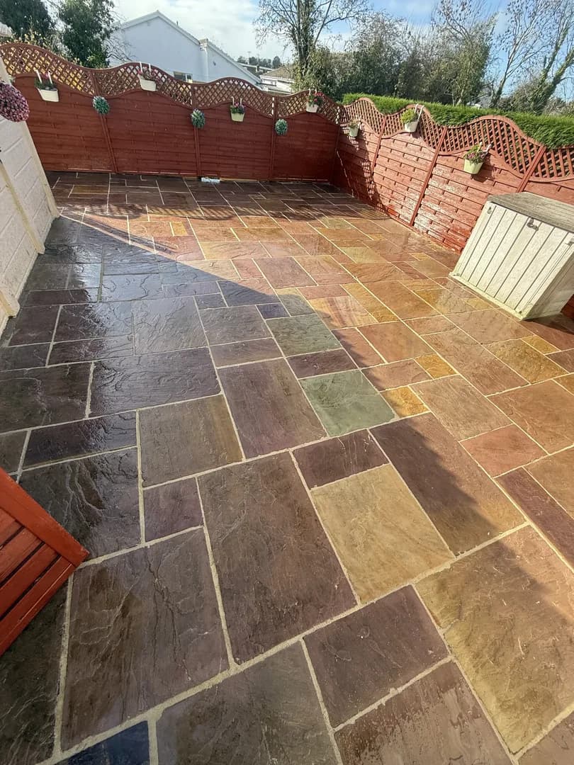 Indian stone patio with decorative edging by Reynolds Brickwork in Barry