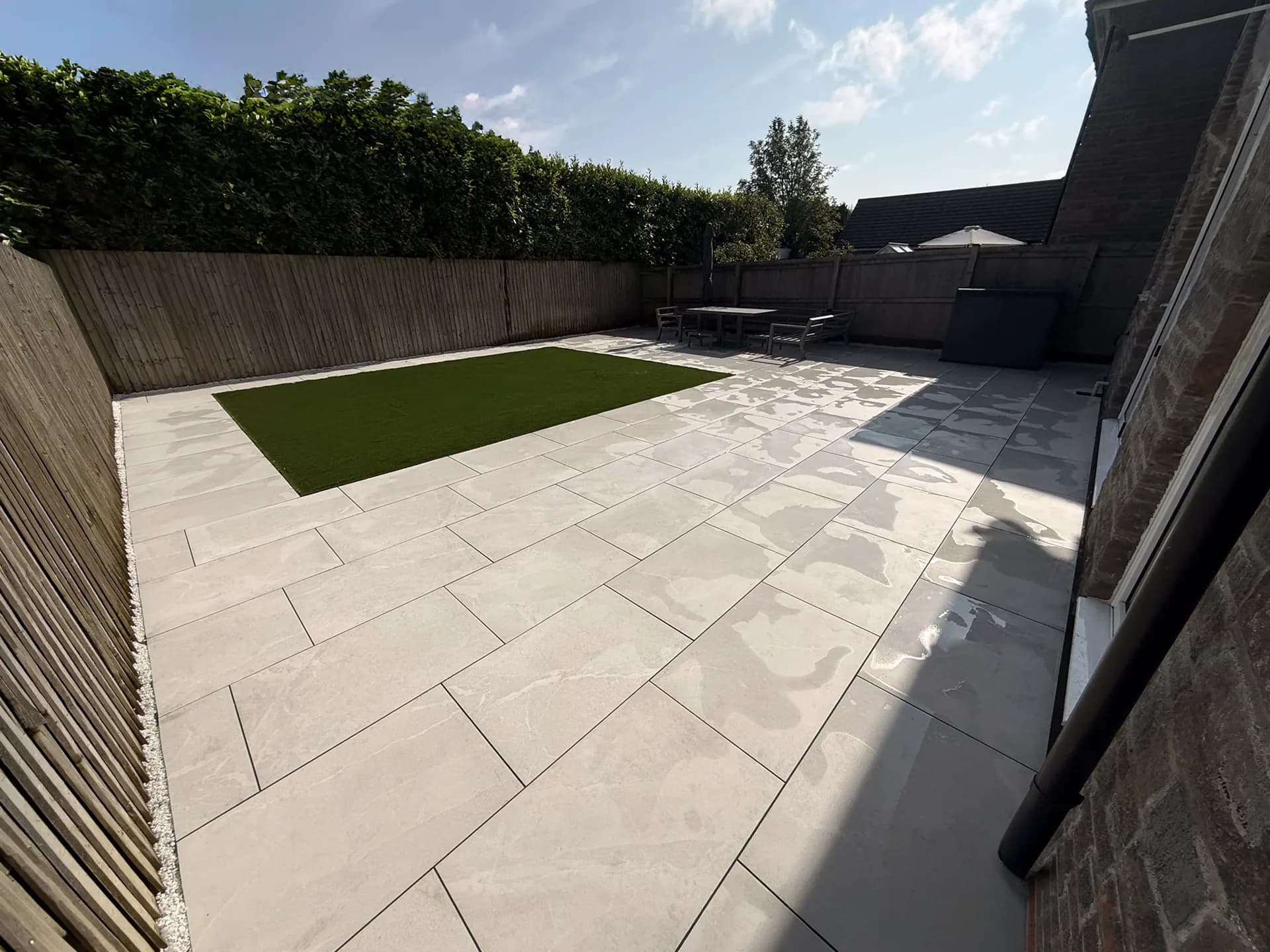 Porcelain patio and landscaping by Reynolds Brickwork in Bridgend, South Wales